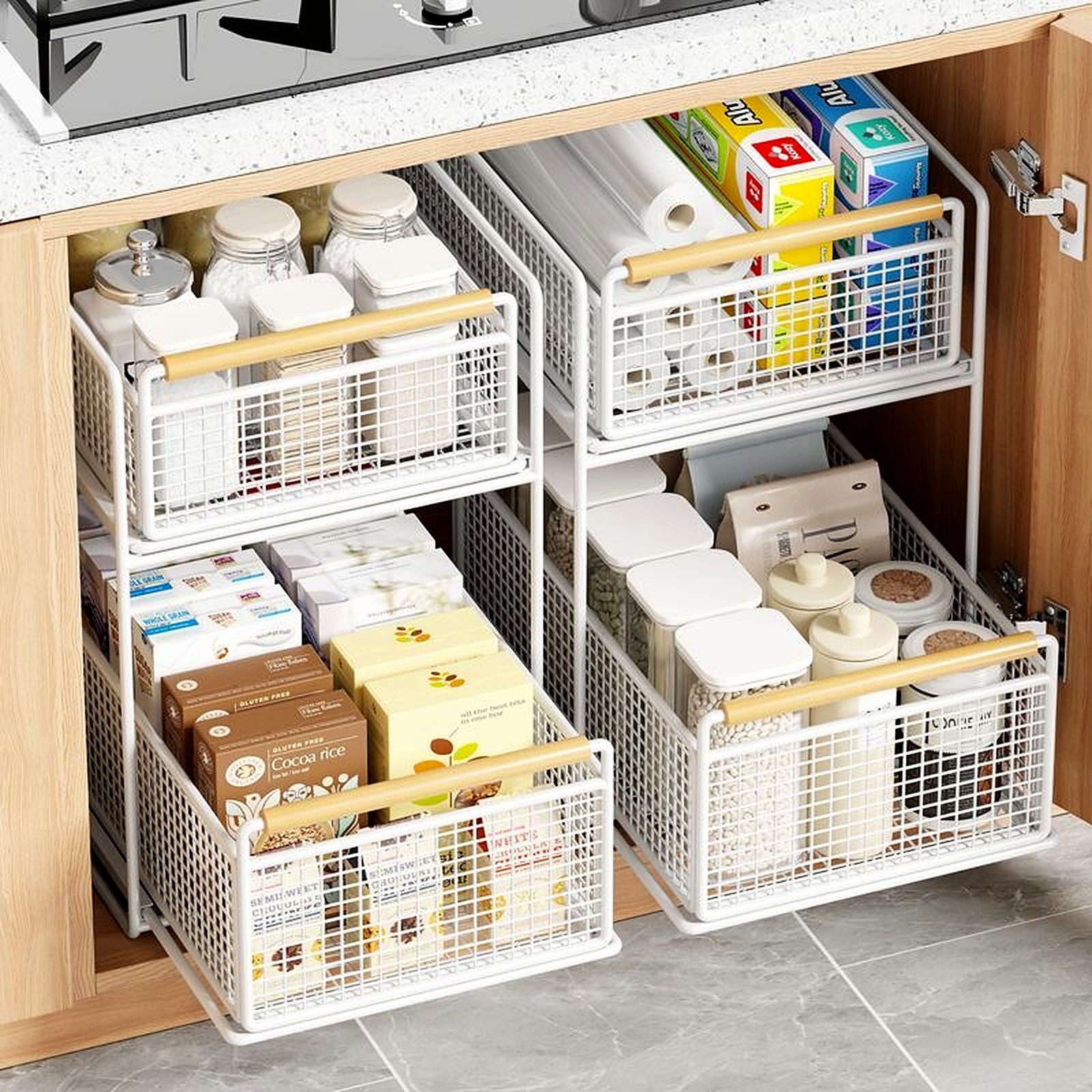 Two-tier under-sink pull-out organizer baskets inside a kitchen cabinet